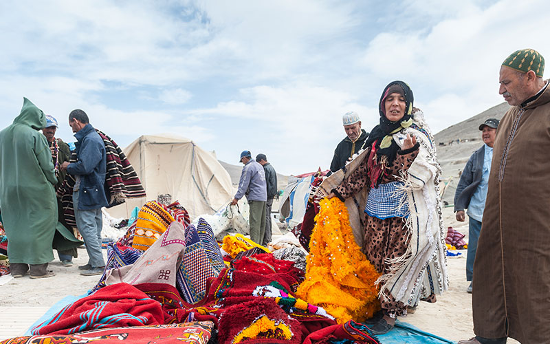 Marchand de Tapis au Souk d'Imichel ,Morocco