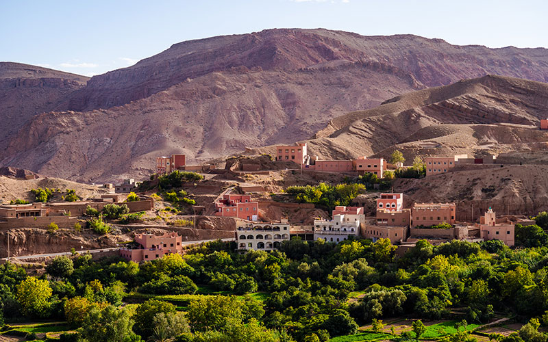 Nature, rocks, houses and mountains in Dades Gorge Morocco during sunset