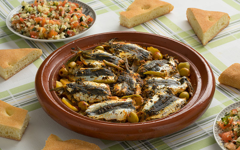 Traditional Moroccan Tagine with sardines and vegetables
